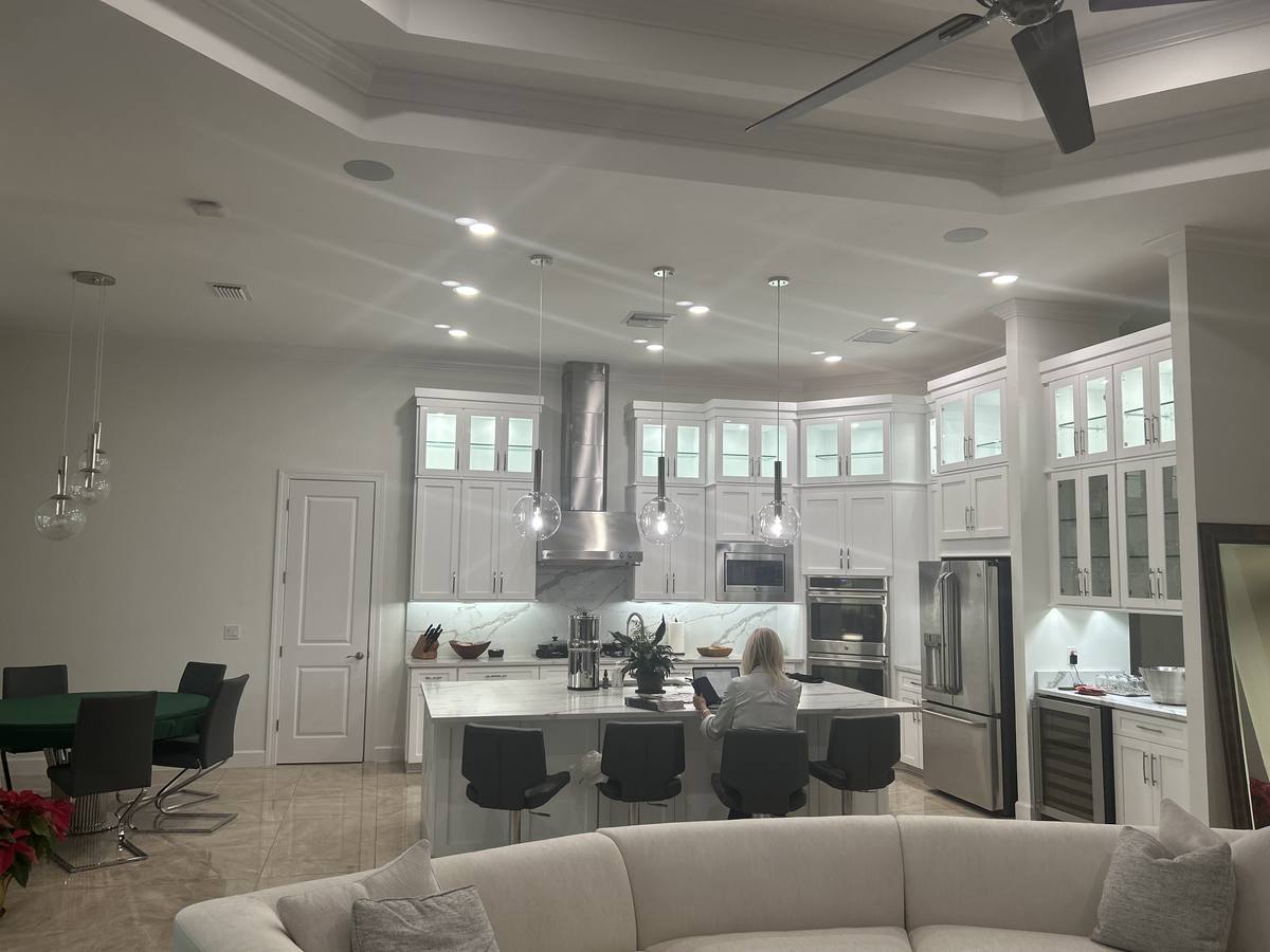 Open kitchen and dining with built-in wine fridge