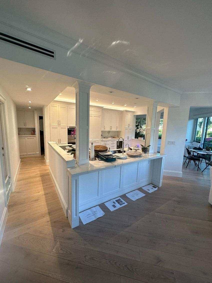 Finished open kitchen with columns