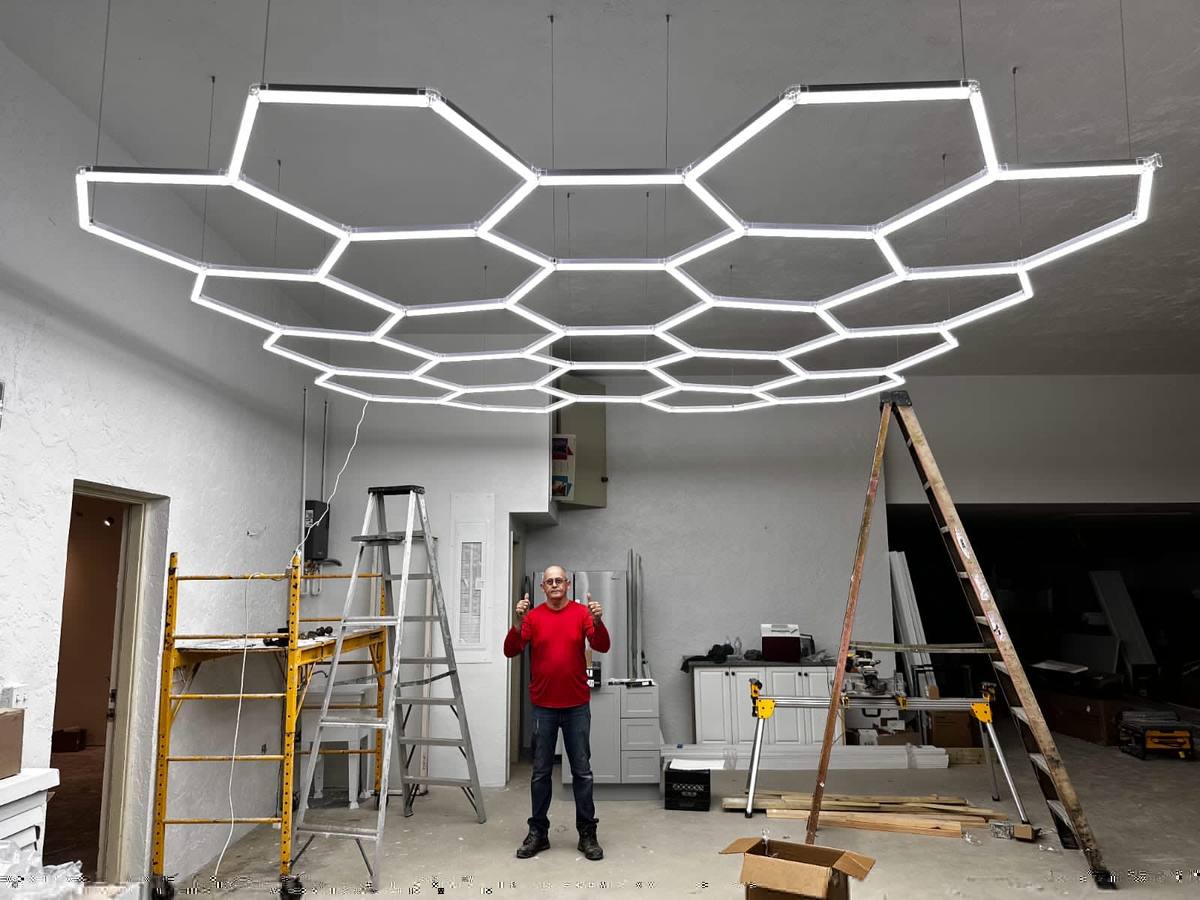 Zoma Construction crew installing a custom ceiling detail